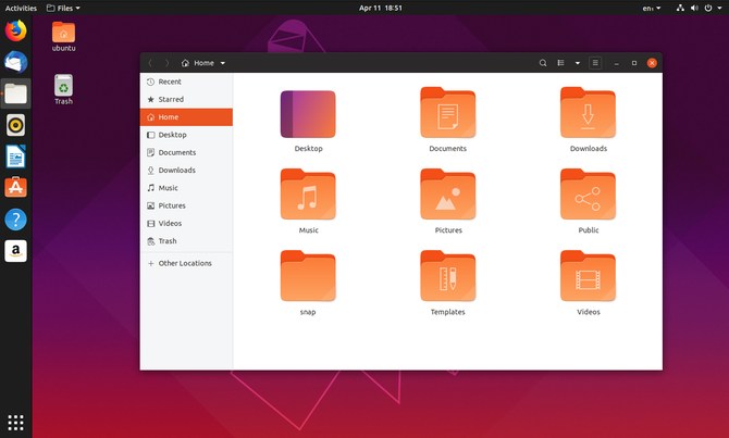 Menedżer plików Ubuntu 19.04 z ikonami pulpitu w tle