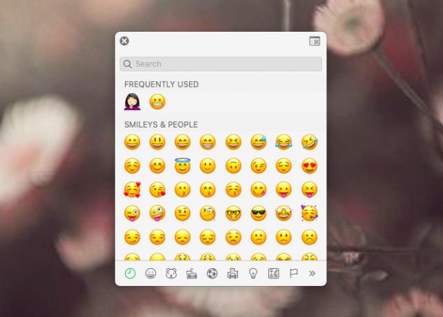 Wyskakujące okienko przeglądarki emoji na macOS